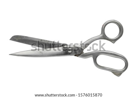 Vintage tailor scissors isolated on white.