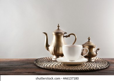 Vintage Tea Set On Wicker Mat