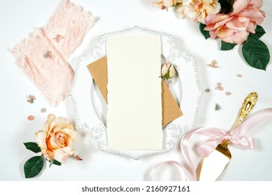 Vintage Theme Wedding Stationery Suite Mockup. Styled With Handcrafted Paper, Blush Pink Vintage Accessories, And Natural Kraft Paper Envelopes. Wedding Table Place Setting With Menu Mock Up.