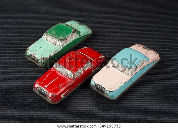 Vintage tiny toy\
cars
