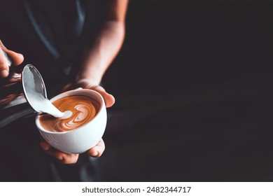 vintage tone of barista pour milk to making latte art coffee at cafe or coffe shop - Powered by Shutterstock