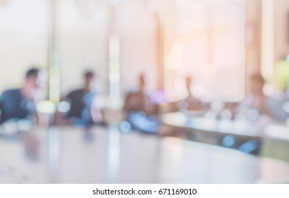 Vintage Tone Blur Image Of Group Of People In Meeting Room For Background.