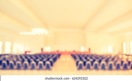 Vintage Tone Blurred Image Of Empty Auditorium Room For Background Usage.