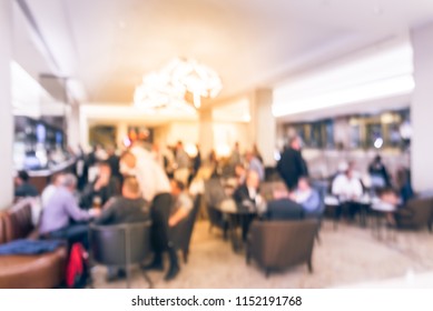 Vintage Tone Blurred Motion People Have Happy Hour, Casual Business Meeting At The Lobby Of Luxury Hotel In San Francisco, California, USA. Blurry Abstract Background Industry Networking Event