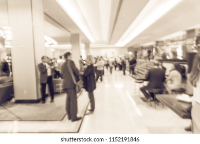 Vintage Tone Blurred Motion People Have Happy Hour, Casual Business Meeting At The Lobby Of Luxury Hotel In San Francisco, California, USA. Blurry Abstract Background Industry Networking Event