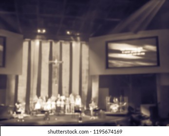 Vintage Tone Blurry Abstract Worship Band And The Choir At Bible Church In Texas, USA. Dark Background, Smoke, Concert Spotlights For Christian Concept. Worship Lyric Projection