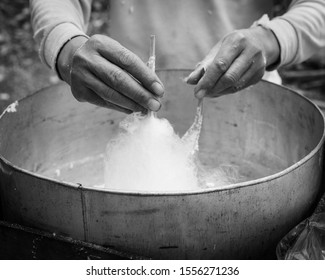 Vintage Tone Close-up Asian Hand Rolling Cotton Candy In Floss Machine In Vietnam. Process Of Street Food Making