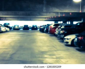 Vintage Tone Underground Parking Garage At American Airport. Rows Of Red And Green Lights Hanging Over The Parking Spaces Show Whether Or Not A Parking Spot Is Open. Smart Parking LoT Guidance System