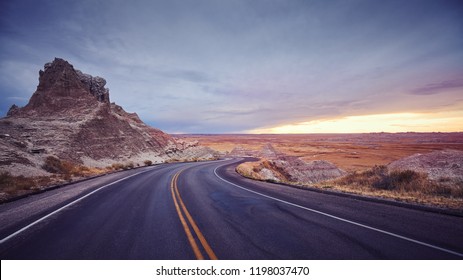 Vintage Toned Panoramic Picture Of A Scenic Road At Sunset, USA.