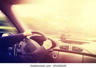 Vintage toned picture of a driving car interior, space for text. - Shutterstock ID 291450329