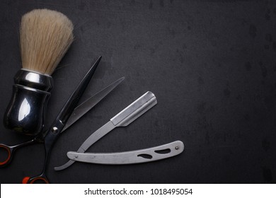 Vintage Tools Of Barber Shop On Black Background