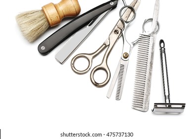 Vintage tools of barber shop on white background