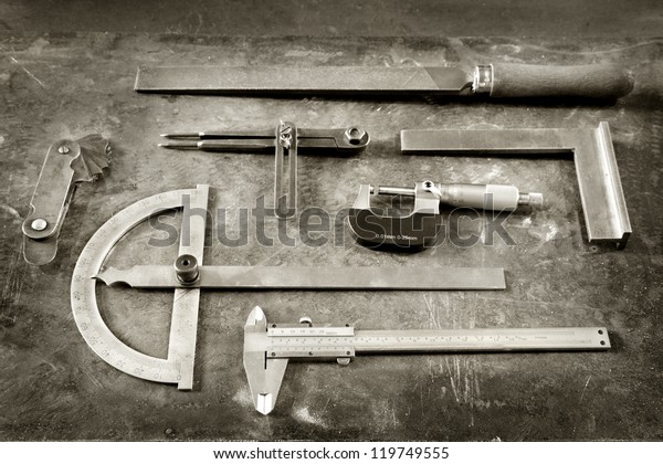 Vintage tools, rasp, caliper, micrometer, divider,\
angle tool