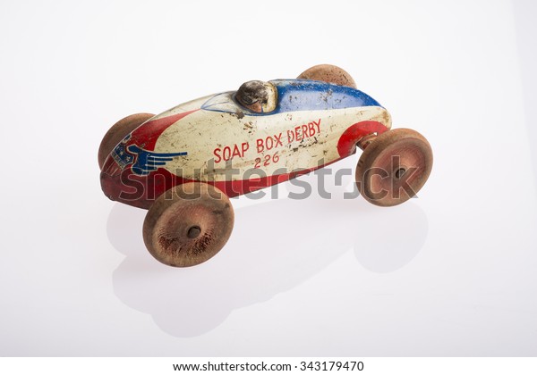 Vintage toy car in white\
background