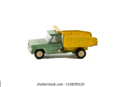 Vintage Toy Dump Truck On White