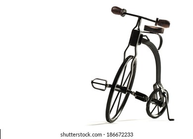 Vintage Toy Velocipede Isolated In White