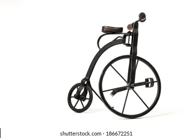 Vintage Toy Velocipede Isolated In White