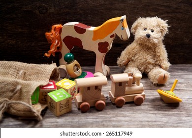 Vintage Toys On Wooden Background