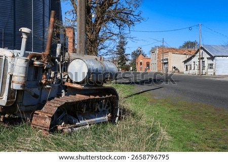 Vintage tractor points down Willard Street in Hartline WA