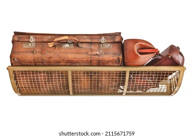 Vintage train luggage rack with bags and suitcase isolated on a white background