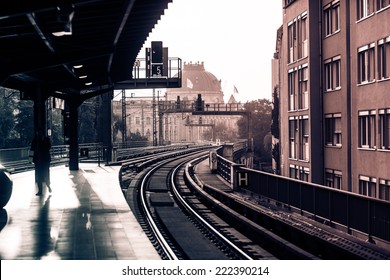 Vintage train station with railway lines in Berlin. Retro filtered. Monochrome cream tone. Black and white photography. - Powered by Shutterstock