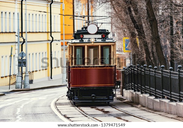 Vintage tram on the town street in the historical\
city center. Moscow.\
Russia,
