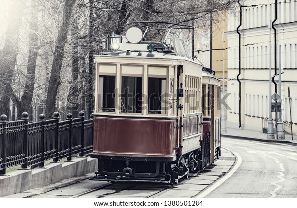 Vintage tram on the town street in the historical\
city center. Moscow.\
Russia,