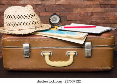 Vintage Travel Suitcase With Map And Compass