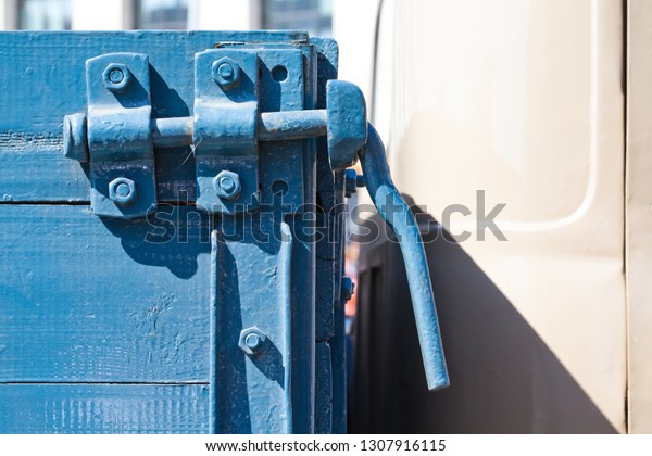 Vintage truck side lock. Retro style transport\
truck with closed handle\
lock.