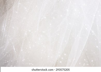 Vintage tulle chiffon texture background with glitter overlay. wedding concept
