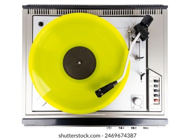 Vintage turntable record player with yellow vinyl isolated on white background. - Powered by Shutterstock