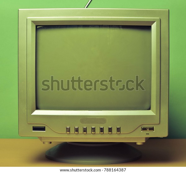 Vintage TV from 80s on a blue pastel background.\
Entertainment 80s.