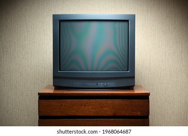 Vintage TV on wooden antique closet, old design in a home.Old black vintage TV. - Shutterstock ID 1968064687