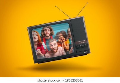 Vintage TV Suspended In The Air On A Yellow Background