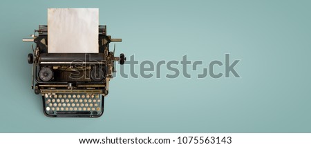 Vintage typewriter header with old paper. retro machine technology - top view and creative flat lay design. 