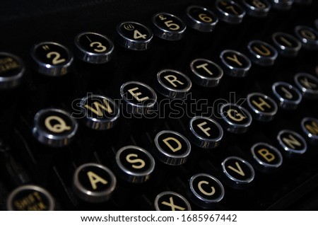 Vintage typewriter keys closeup - qwerty keyboard configuration