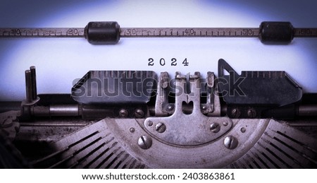 Vintage typewriter with a short message; 2024