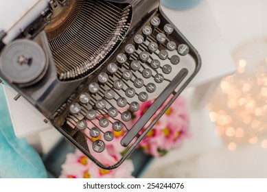 Vintage typewriter and spring flowers