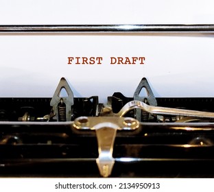 Vintage Typewriter With White Blank Paper Typed FIRST DRAFT, Concept Of A Rough Draft Or Very First Version Of Of Writing Piece - Sketch Of What Writing Work Will Be Like