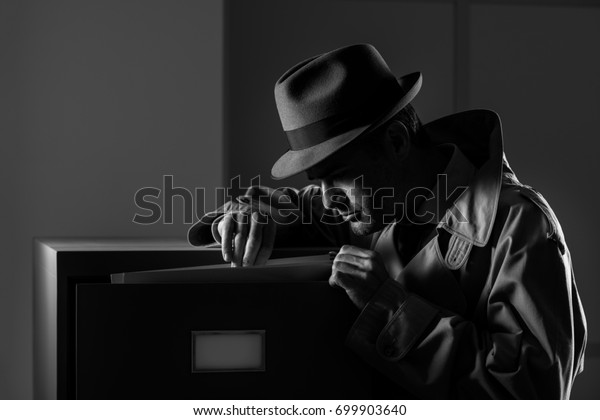 Vintage Undercover Criminal Spy Stealing Files Stock Photo 699903640 ...