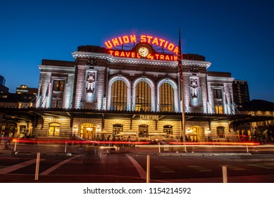 Vintage Union Station transportation center at dusk with streaking lights and bright lamps on August 9, 2018 in Lodo, Denver.