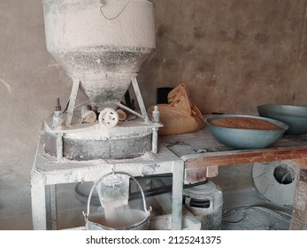 Vintage And Unique Handmade Flour Mill Or Flour Machine. Industrial Machine. Industrial Equipment. Cornmeal With Corn And Flour