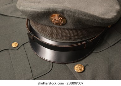 Vintage United States army military hat and coat from 1950s era