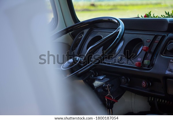 Vintage van interior\
with steering wheel