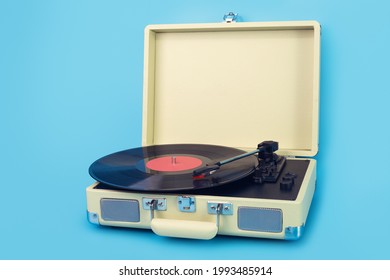 
				Vintage vinyl record player isolated on blue background