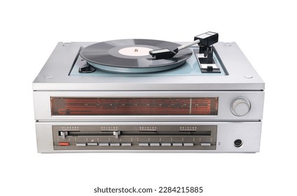 Vintage vinyl record player with record and radio tuner isolated on white background.