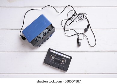 Vintage Walkman Or Cassette Player With Earbuds And Mix Tape