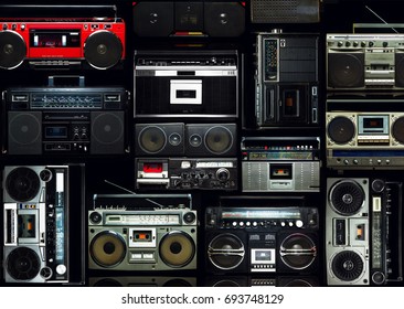 Vintage wall full of radio boombox of the 80s - Shutterstock ID 693748129