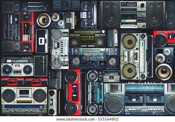 Vintage wall full\
of radio boombox of the\
80s