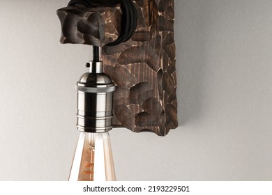 Vintage Wall Lamp To Illuminate The Terrace. Antique Lamp With Edison Bulb. The Concept Of Saving Energy Or Lack Of Ideas. Turned Off Lamp On A Light Background.